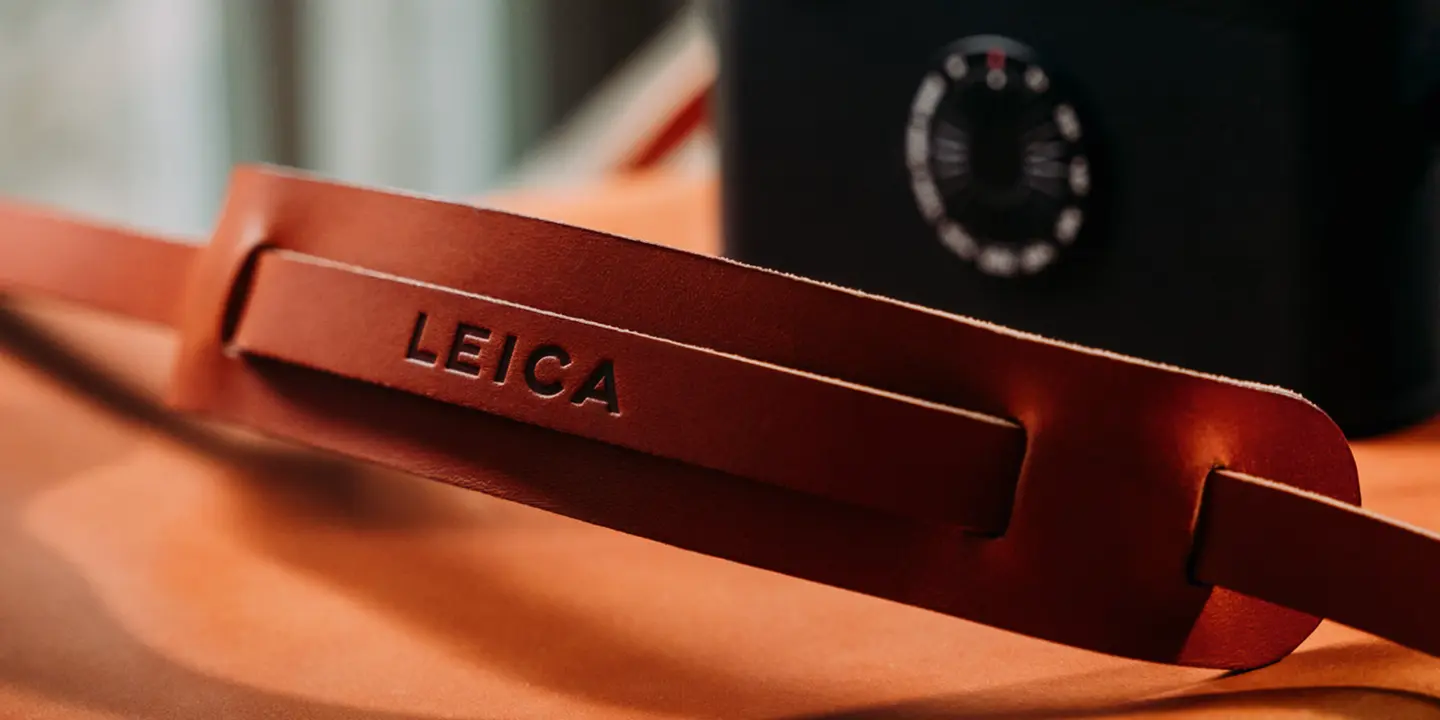 Leica camera with accessory strap
