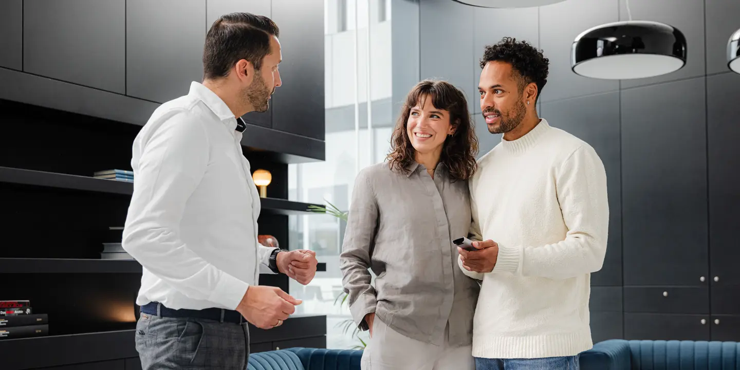 Couple receiving consultation on Cine Play 1 at Leica Store