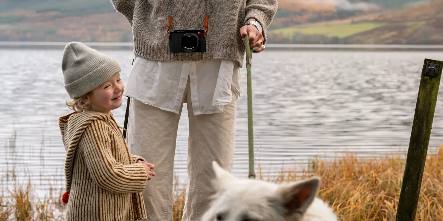 Nina Davidson with his daughter and dog at the lake