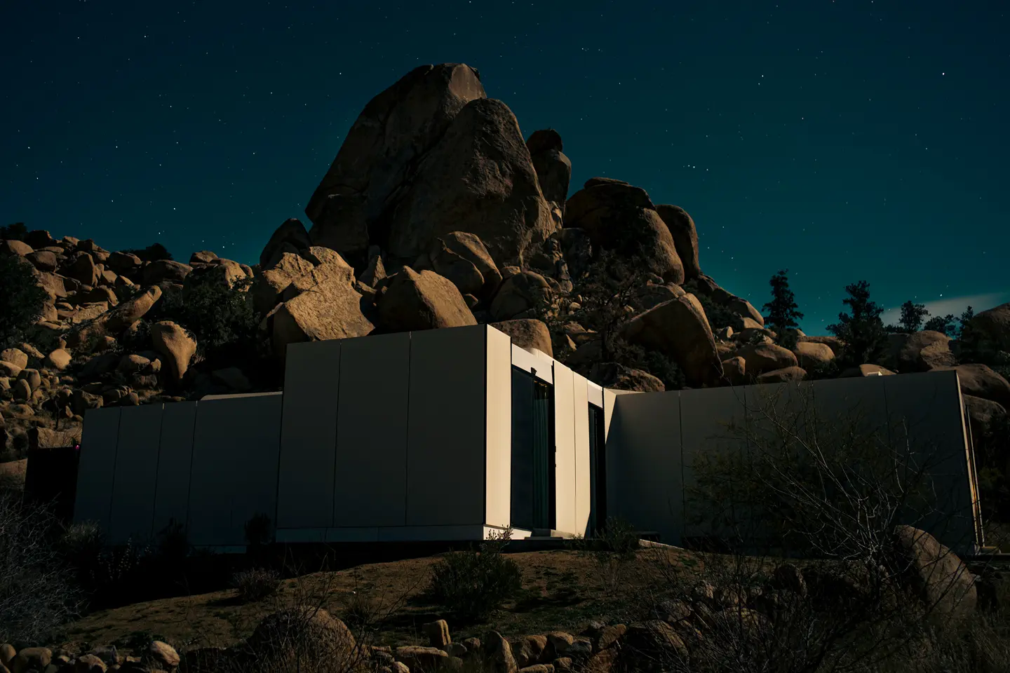 Architectural building in the rocks in the evening sun.