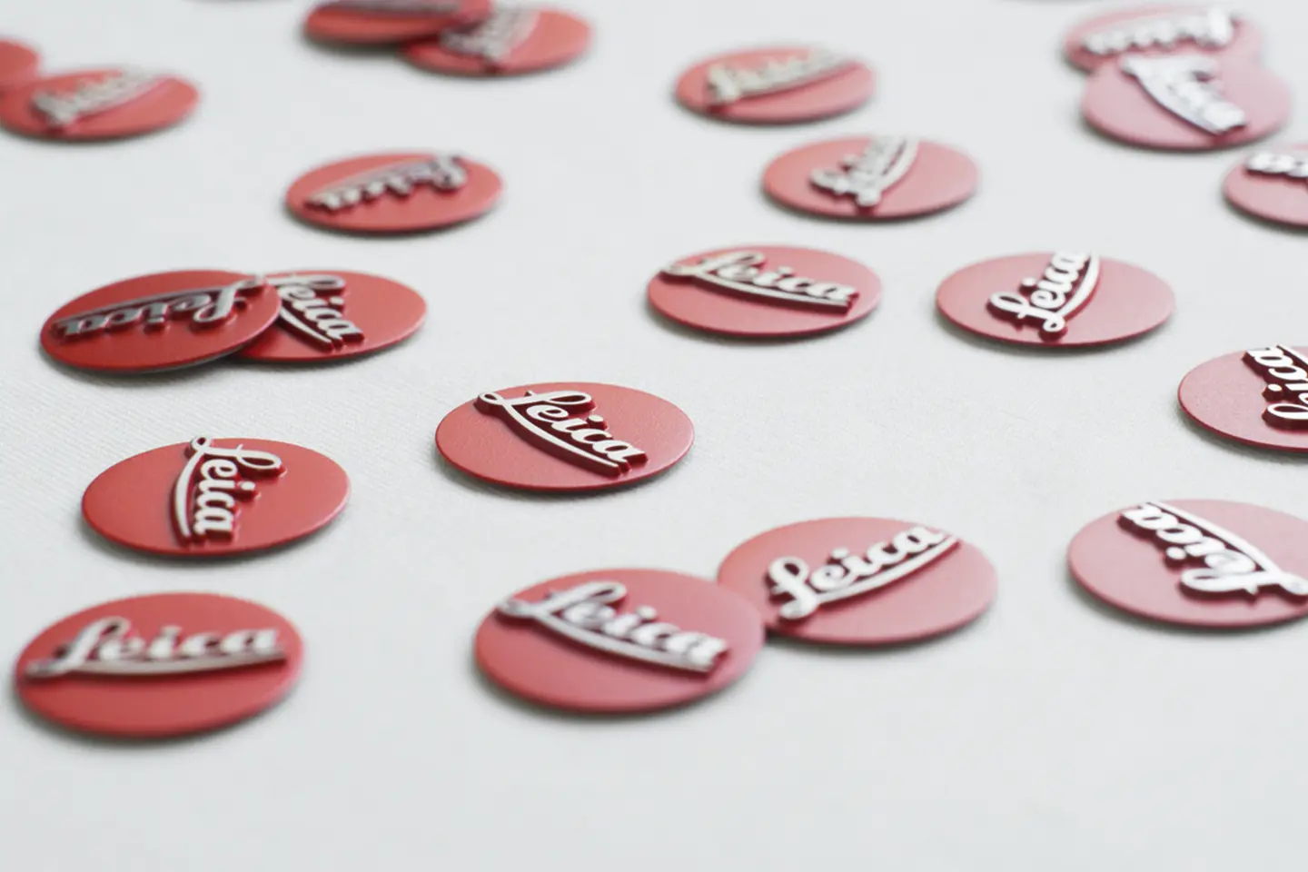 Buttons labeled Leica are distributed on a white background.