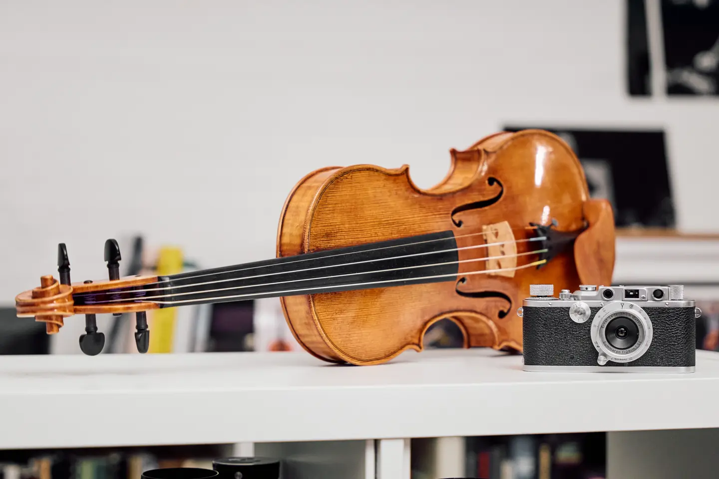 violin and a leica camera