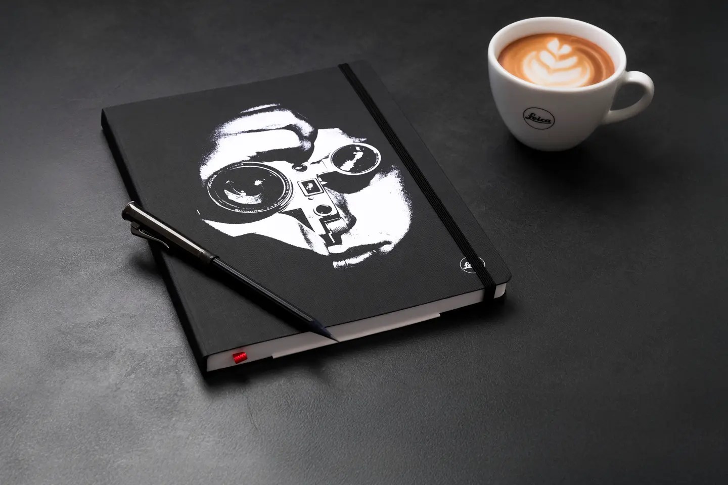 Leica Notebook 'The Photojournalist' with a pencil and Leica Coffe Cup