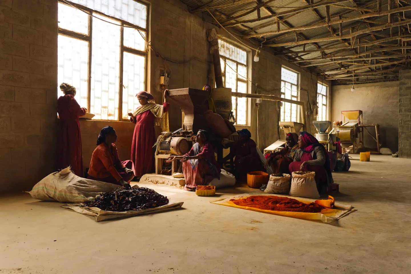 Work carried out by women at a managed spice mill in Ethiopia
