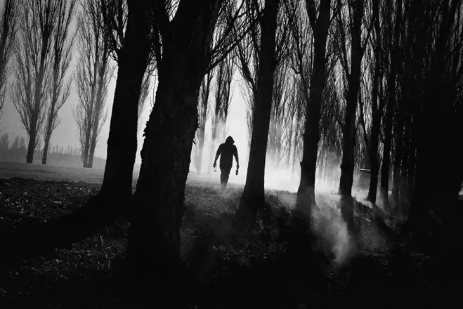 man in the woods b&w