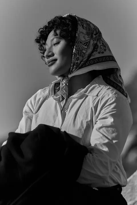 Black-and-white photograph of a woman