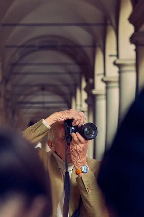 John Golberger is making a picture with a Leica and a Leica ZM 12 on his wrist
