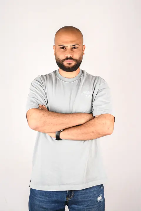 Portrait of Saher Alghorra