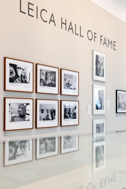 Exhibition view of the Leica Hall of Fame, with framed photographs by Herlinde Koelbl displayed along a gallery wall.
