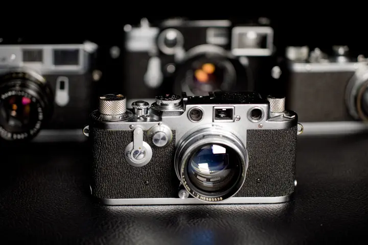 A group of Leica M cameras.