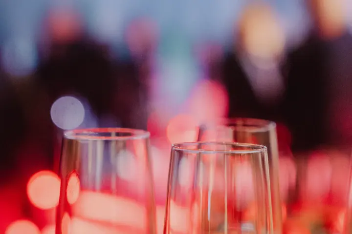 Mood image with champagne glasses in the foreground