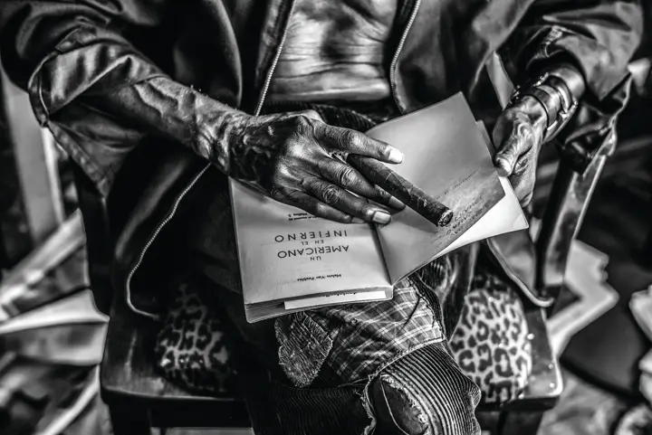 Man with cigar and book