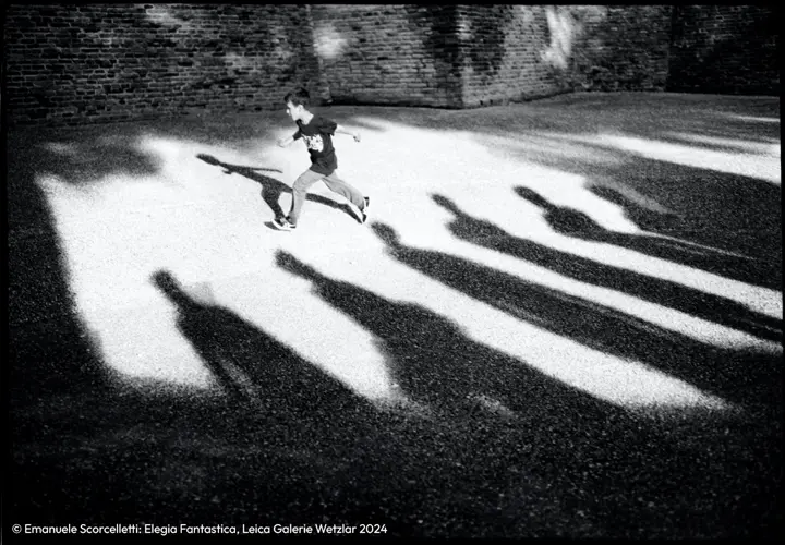 Boy runs on the street