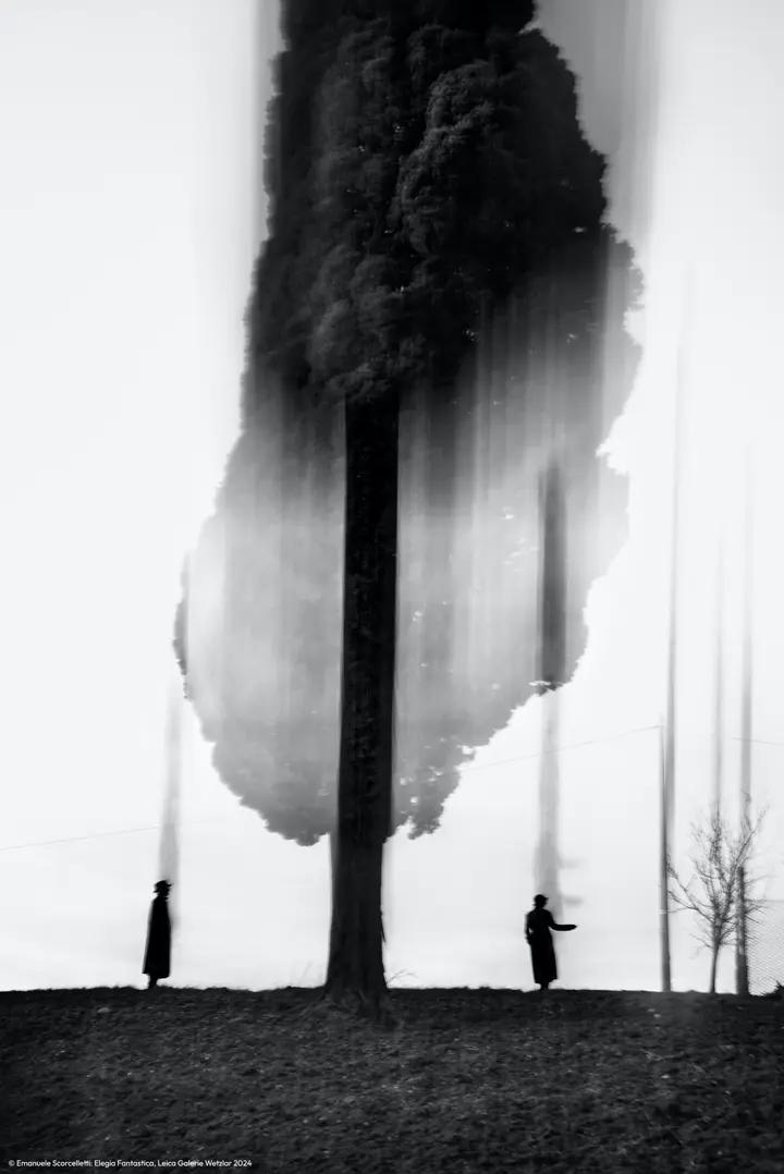 Disappearing scene in black and white with two people