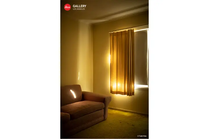Photography by Todd Hido showing the corner of a dark room.