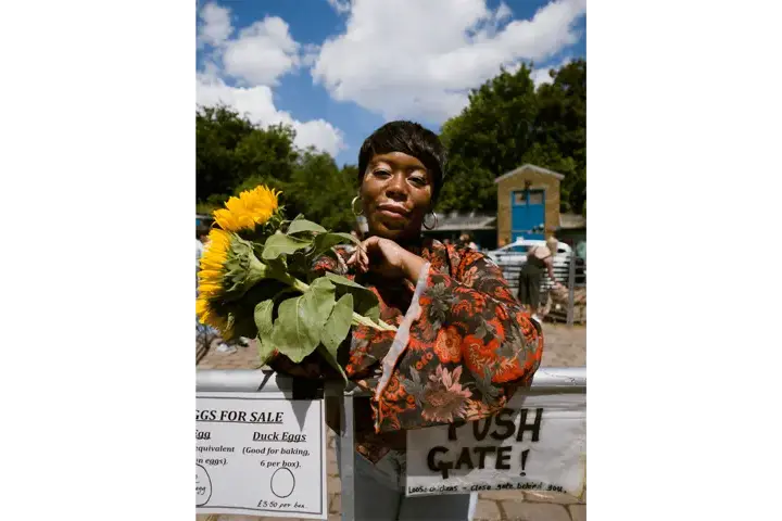 Portrait of a woman with sunflowers