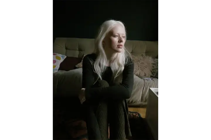 Portrait of a woman in her house