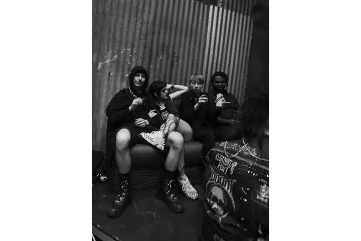 A group portrait of British young people.