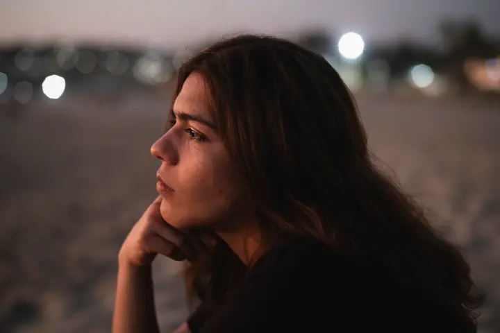 Lateral shots of a woman looking thoughtful