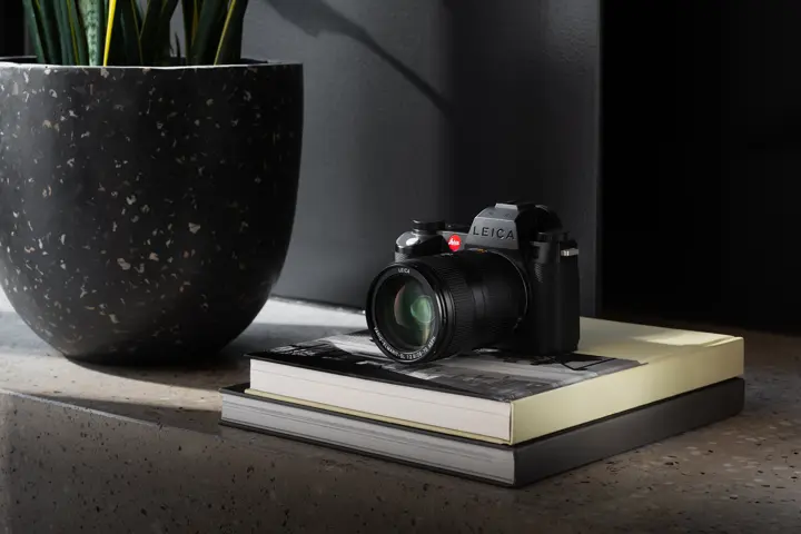 Leica SL3-S with Vario-Elmarit 28-70 f2.8 ASPH. lens on a cabinet