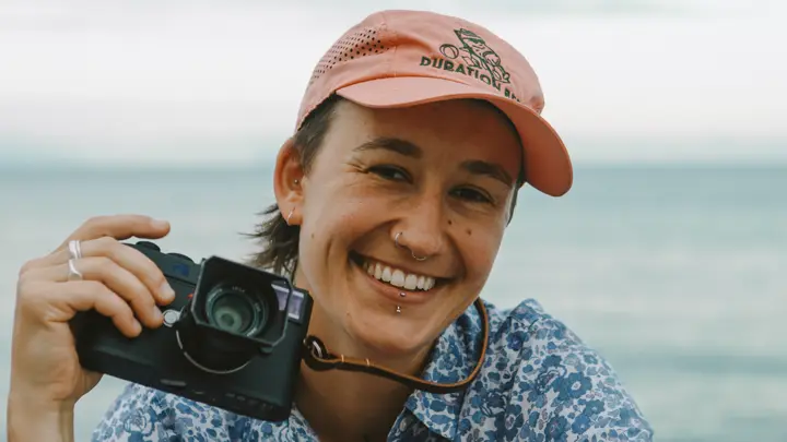 Colour Photo of Amelia holding a Leica M11-D