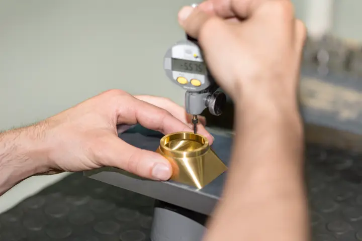 Mechanic working on a lens