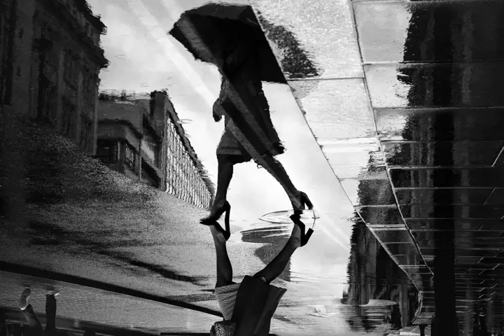 Black and White Street Photography woman with an umbrella