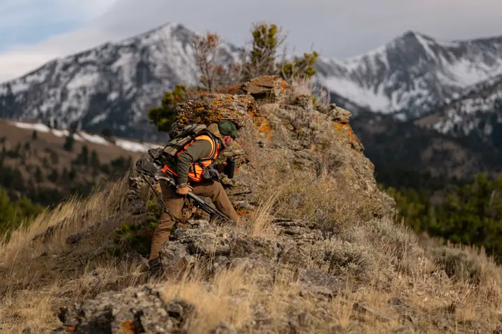 Hunter in the field using his Leica Geovid Pro