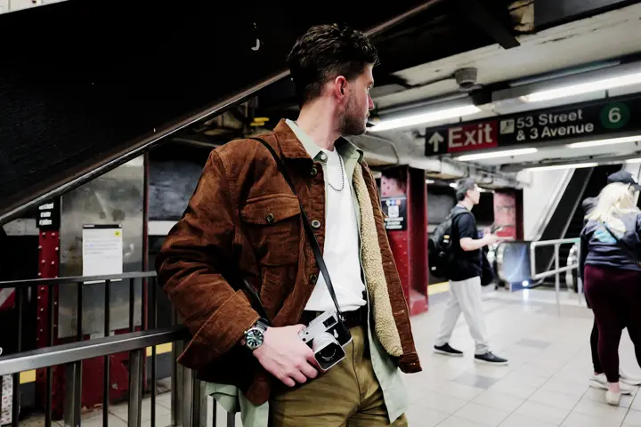 Man at the station with a Leica SL3 and a Leica ZM11 watch on his wrist
