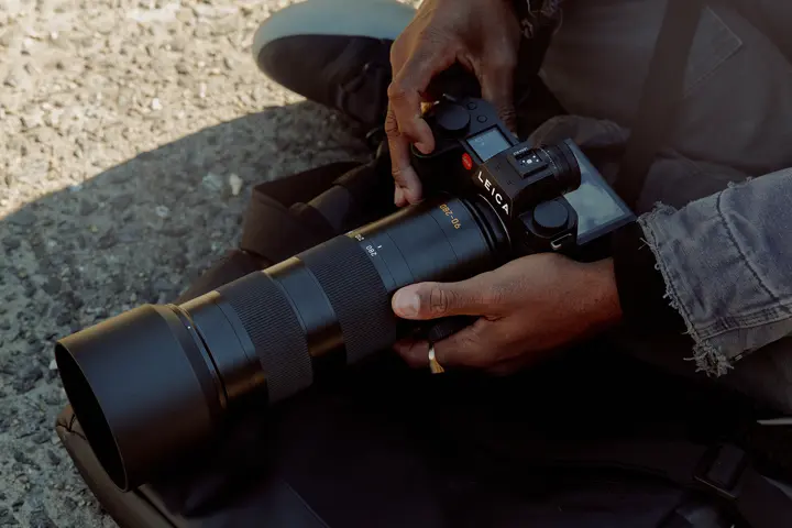 Leica SL3 with APO-Vario-Elmarit-SL 90-280 in hands from above