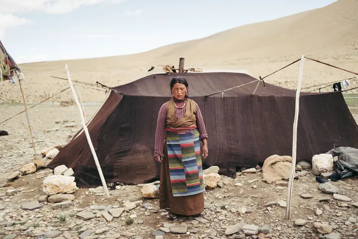 Woman infront of tent