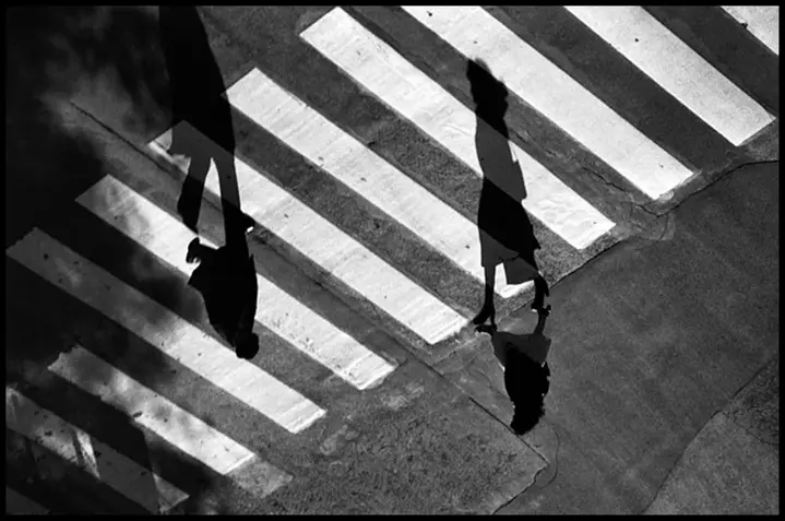 people walking on the street b&w