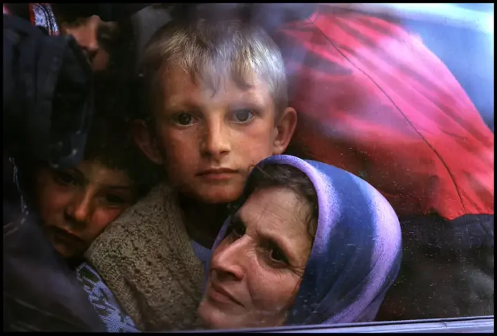 grandma and child and window