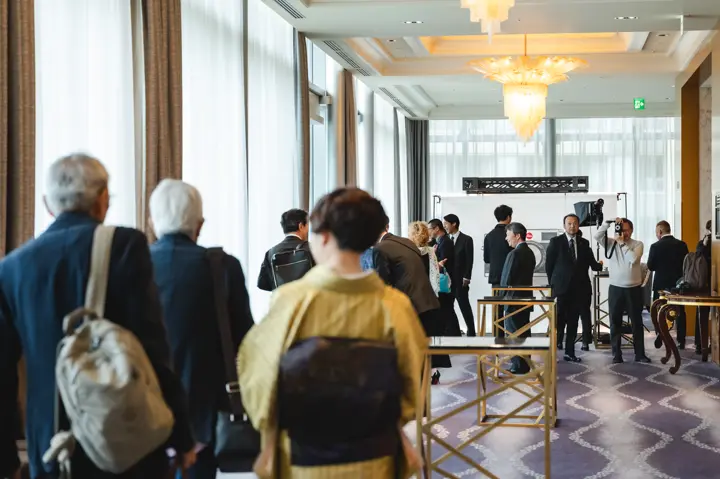At the Leica Ginza Store Anniversary Dinner, guests arriving at the venue
