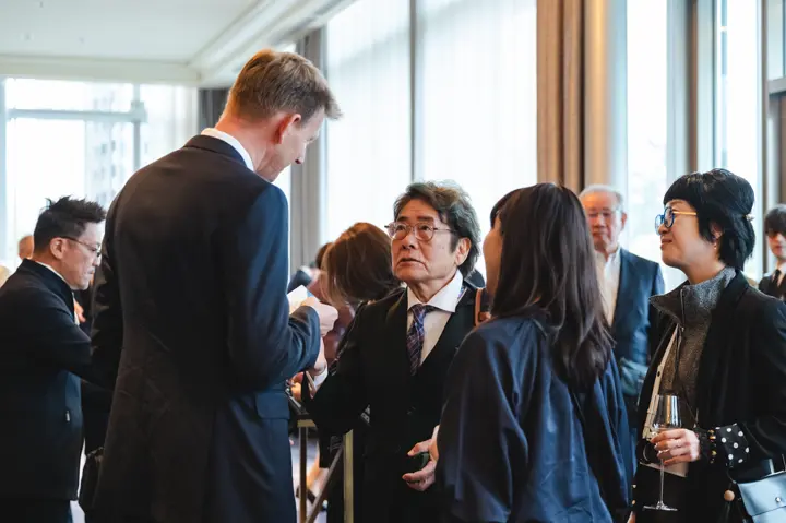 At the Leica Ginza Store Anniversary Dinner, guests networking during reception
