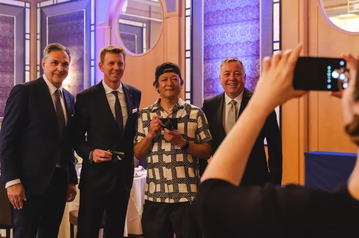 At the Leica Ginza Store Anniversary Dinner, guests capturing a photo moment