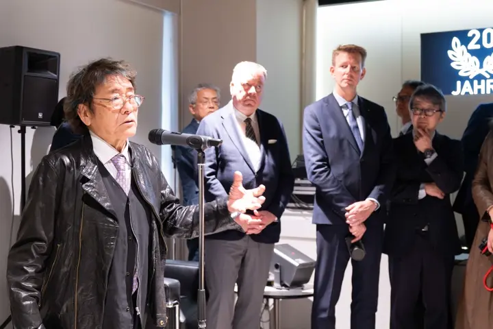 At the Leica Ginza 20th Anniversary Photo Exhibition Opening, opening remarks with audience gathered