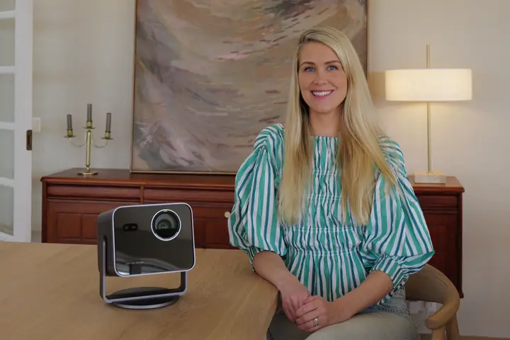 Asa Steinars in her livingroom with the Leica Cine Compact 1