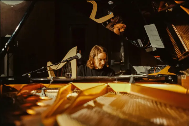 A person is playing the piano