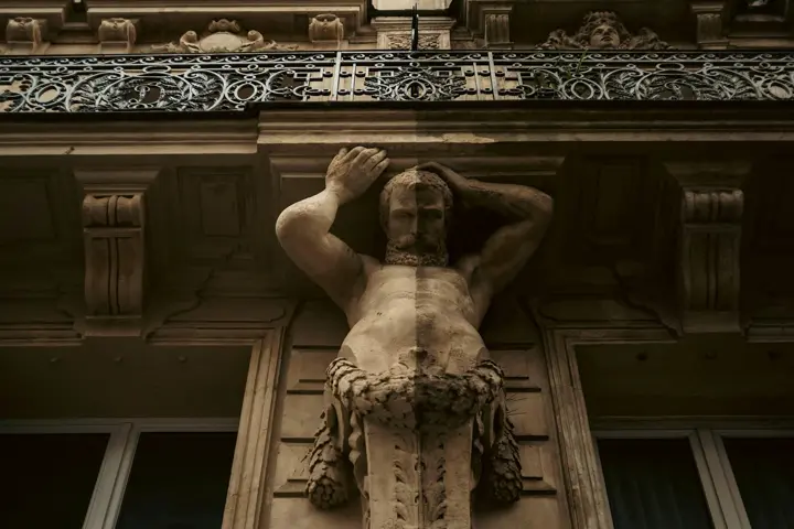 A sculpture on the outside of a building
