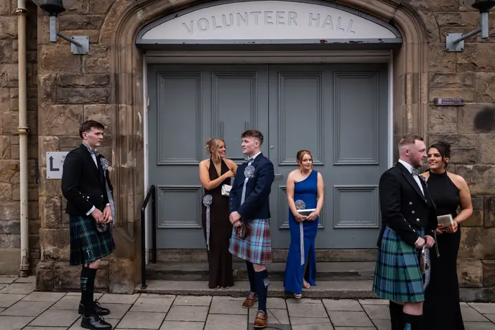 Scottish People in front of a volunteer hall