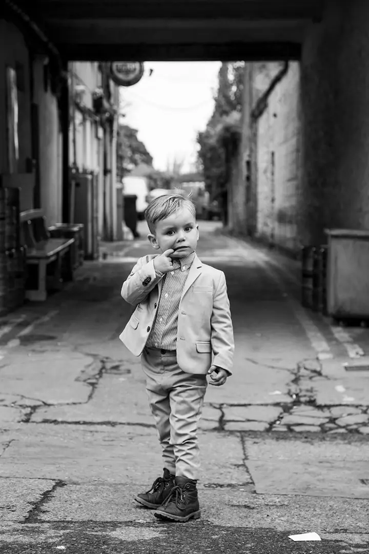 Jamie Johnson image - Boy on street - titled Sunday Best