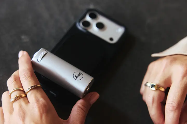 Leica LUX Grip in silver in use