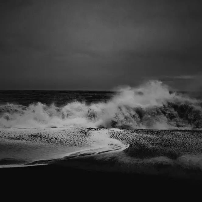Black and white photo of turbulent waves