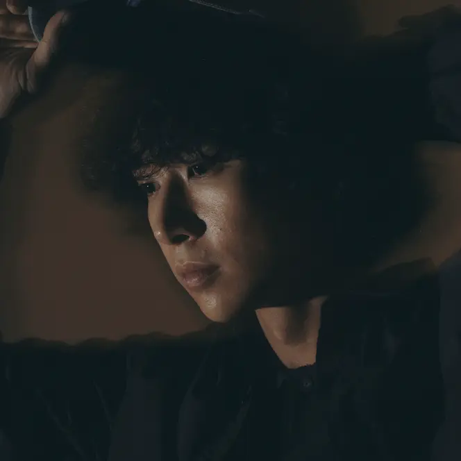 Close-up of a person laying on the floor.