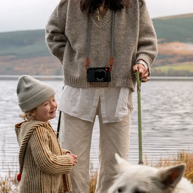 Nina Davidson with his daughter and dog at the lake