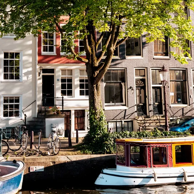 Colour image of a canal in Amsterdam