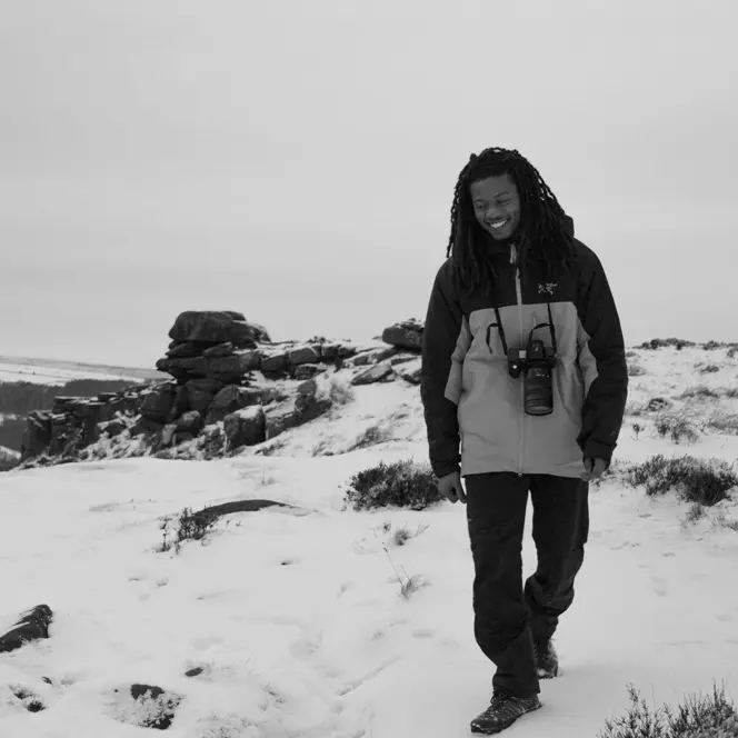 Black and White photo Of Henry Jay Kamara with the SL3-S.