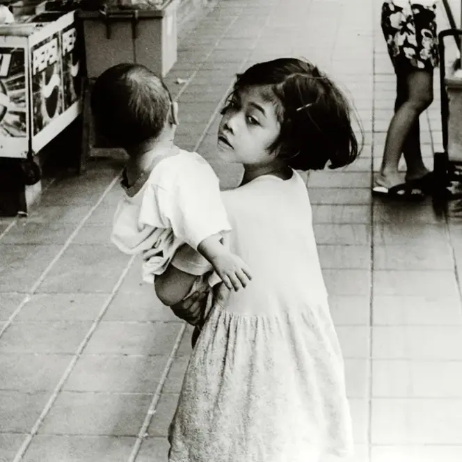 little girl analog with doll