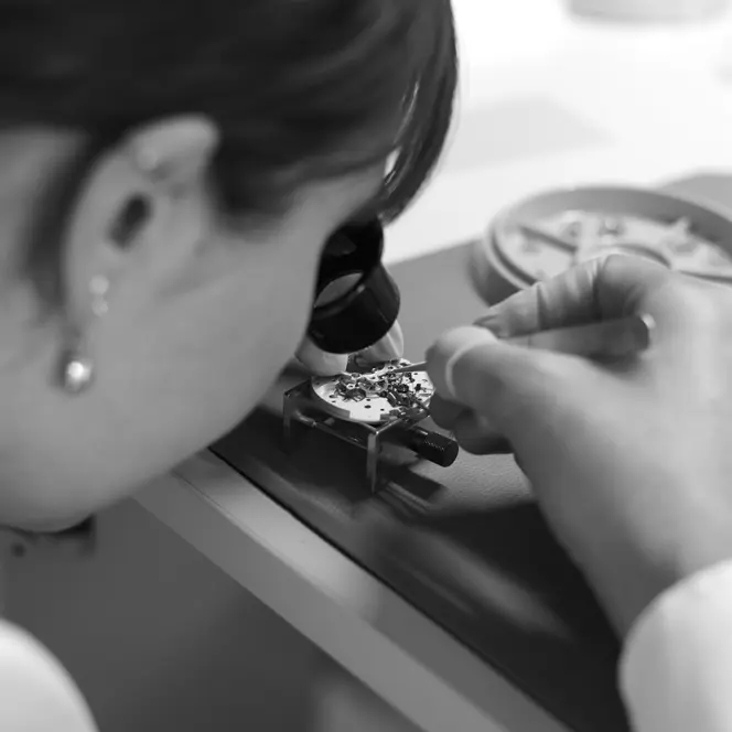 A woman assembling a Leica watch